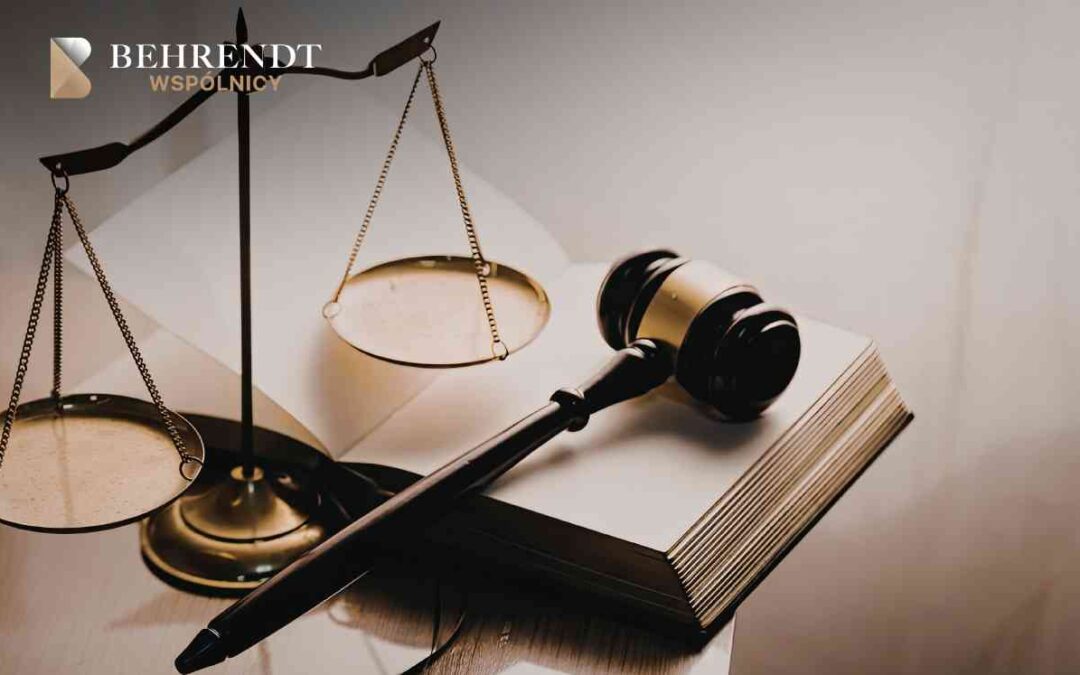 Scales of justice and a gavel atop an open law book, symbolizing legal proceedings with a logo in the corner.
